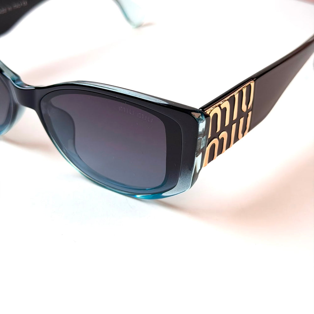 Miu Miu Sculpted Cat Eye – Teal Black