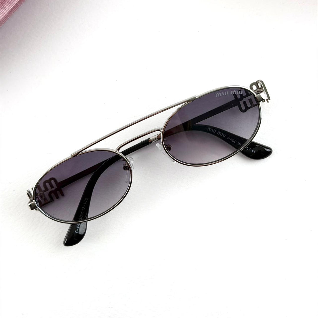 Miu Miu Oval Metal – Silver Grey Edition