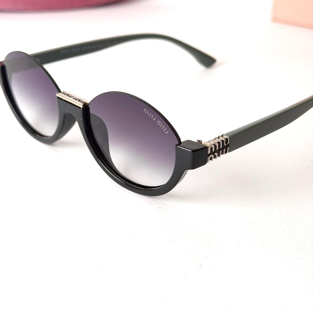 MIU MIU Rimless Round – Black Silver Gradient
