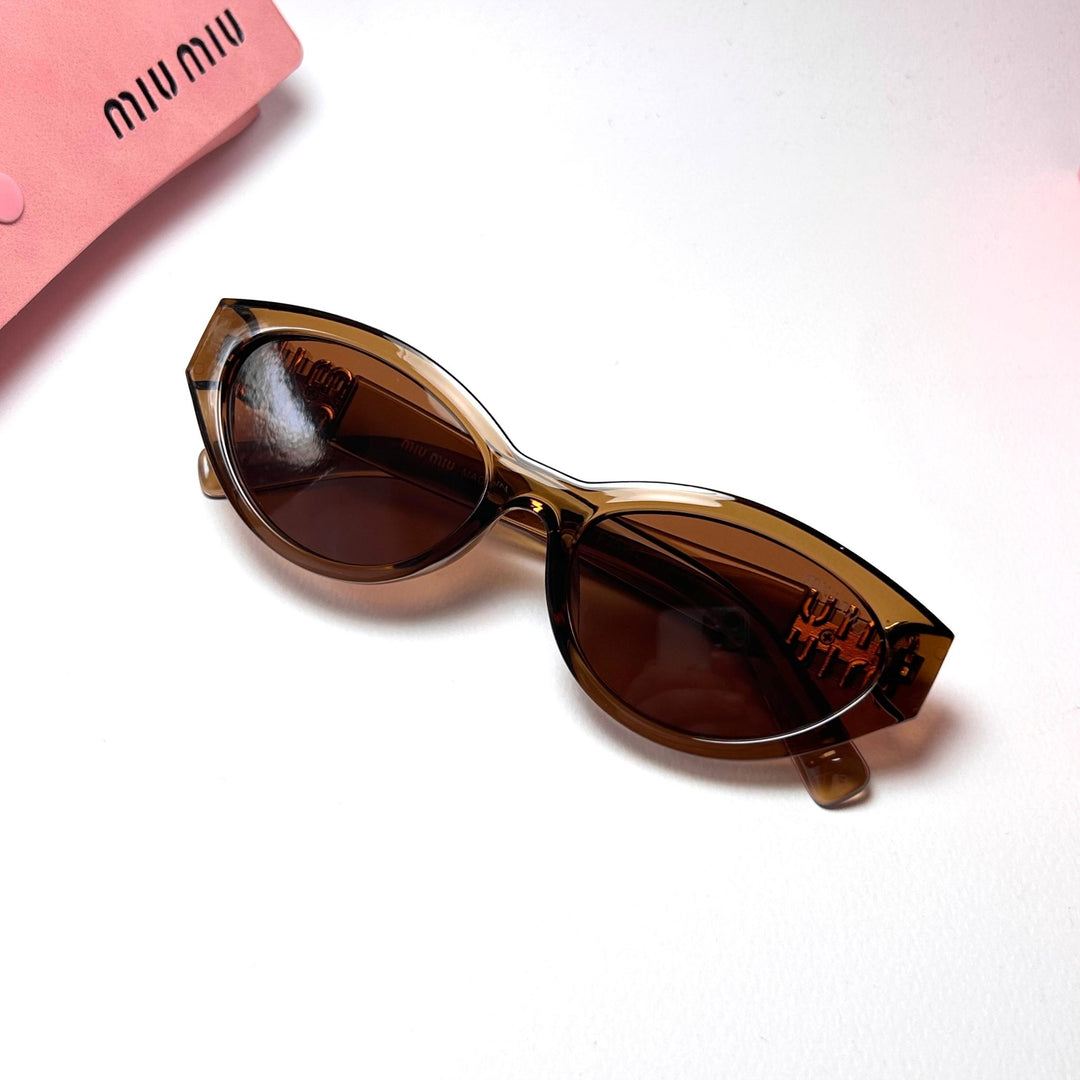 Miu Miu SMUA04 Cat Eye - Transparent Brown.