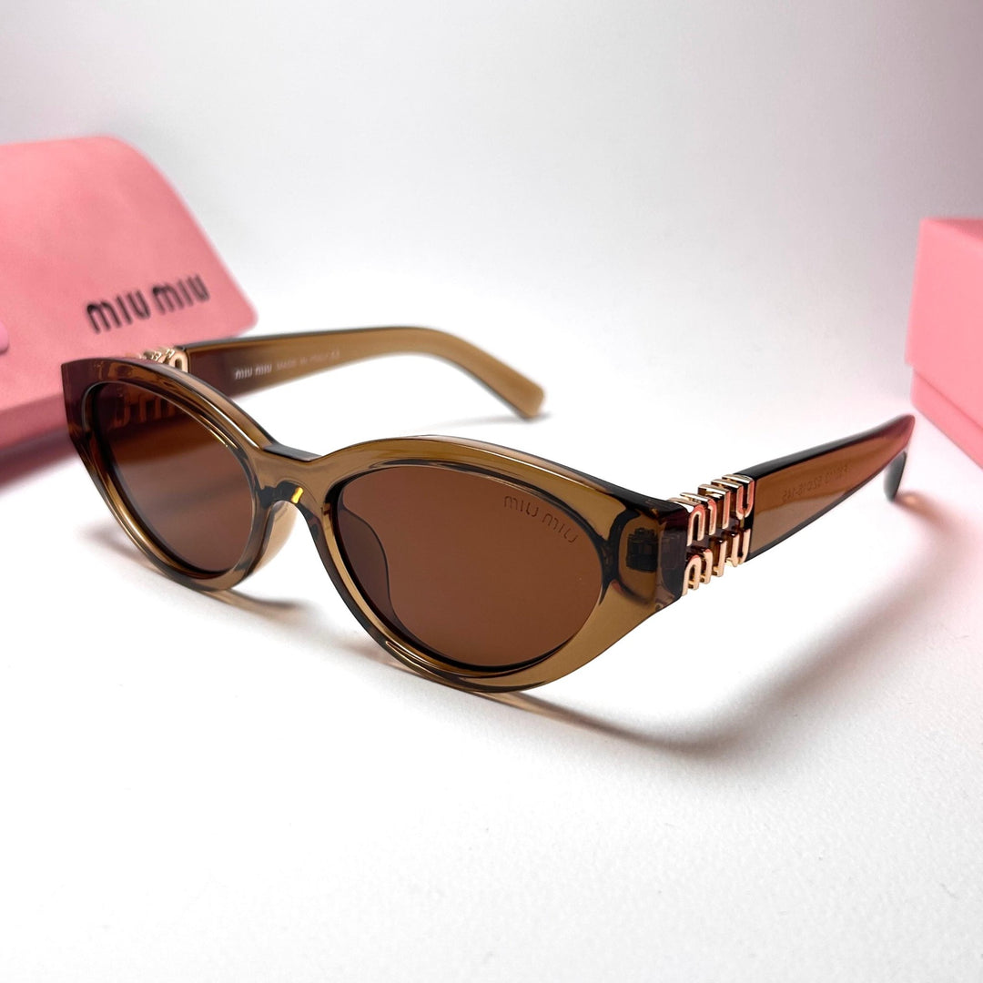 Miu Miu SMUA04 Cat Eye - Transparent Brown.