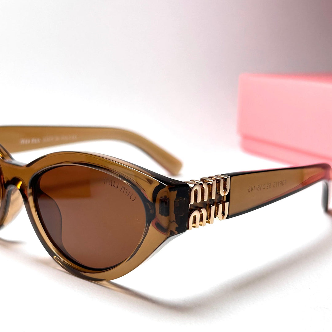 Miu Miu SMUA04 Cat Eye - Transparent Brown.
