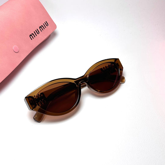Miu Miu SMUA04 Cat Eye - Transparent Brown.